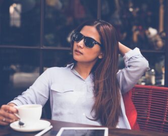 woman drinking coffee alone