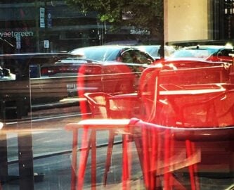 tables reflected in the glass